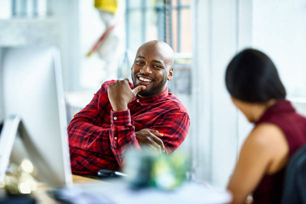 Man and woman talking in modern office
